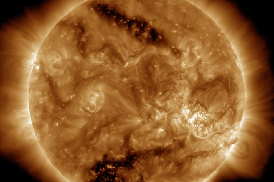 Two Coronal Holes on the Sun Viewed by SDO